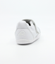 XP Go showing the white leather upper, rounded toe and flexible low‑profile sole.