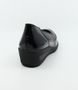Schwarz leather slip-on shoe with HighSoft cushioning and low wedge sole