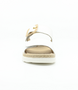 White leather slingback sandal with decorative buckle and flexible side-stitched sole