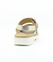 Sand Platinum leather slingback sandal with decorative buckle and flexible side-stitched sole