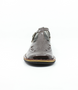 Brown leather girls T‑bar school shoe with perforated vamp and buckle strap.