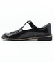Black leather girls T‑bar school shoe with perforated vamp and buckle strap.