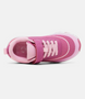 Magenta junior school sports shoe with low profile and athletic silhouette