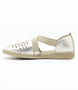 Platinum womens leather flat with laser cut perforations, open side panels and semi curved instep strap.