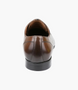 Teak mens leather plain toe derby with sleek silhouette, cushioned footbed and durable rubber sole.