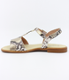 Champagne girls snakeskin‑effect leather sandal with buckle strap and cushioned sole.