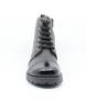 Black girls leather ankle boot with quilted upper, lace‑up front, side zip and tread sole.