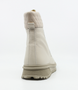 Beige girls leather ankle boot with quilted collar, lace‑up front, side zip and tread sole.