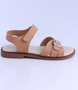 Camel girls leather sandal with buckle and ankle strap.