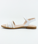 White girls leather sandal with braided front strap, stud detail and buckle ankle strap.
