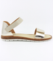 Gold girls leather sandal with hook‑and‑loop straps and cork‑textured sole.