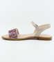 Pink girls leather dress sandal with glitter strap and ankle buckle.