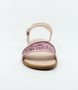 Pink girls leather dress sandal with glitter strap and ankle buckle.