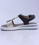 Black Gold White girls leather sandal with buckle and platform sole.
