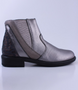 Silver girls leather and nubuck ankle boot with patterned heel, side zip and low heel.