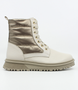 Beige girls leather ankle boot with metallic quilted panels, lace‑up front, side zip and tread sole.