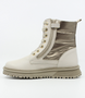 Beige girls leather ankle boot with metallic quilted panels, lace‑up front, side zip and tread sole.