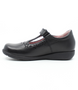 Black girls leather T‑bar school shoe with floral cut‑outs and hook‑and‑loop strap.