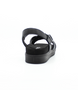 Nero women’s synthetic crossover strap sandal with cushioned footbed and tonal ankle strap.