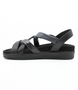 Nero women’s synthetic crossover strap sandal with cushioned footbed and tonal ankle strap.