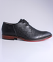 Preto men’s leather dress shoe with stitched stripe texture, two‑eyelet lace‑up and contrast sole.