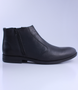 Black men’s leather ankle boot with side zip and cushioned sole.