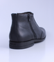 Black men’s leather ankle boot with side zip and cushioned sole.