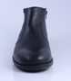 Black men’s leather ankle boot with side zip and cushioned sole.