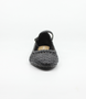 Negro women’s woven leather flat with pointed toe, adjustable strap and low block heel.