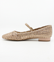 Nude women’s woven leather flat with pointed toe, adjustable strap and low block heel.