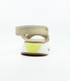 Beige women’s mesh sporty sandal with crisscross straps and chunky platform sole.