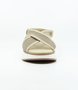 Beige women’s mesh sporty sandal with crisscross straps and chunky platform sole.