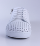 White women’s punched leather casual sneaker with lace‑up front, side zip and cushioned insole.