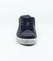 Navy women’s leather sneaker with lace‑up front, side zip and cushioned insole.