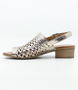 Pewter women’s laser‑cut leather sandal with adjustable strap and low block heel.