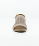 Beige women’s laser‑cut leather sandal with adjustable strap and low block heel.