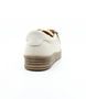 Cream women’s leather casual sneaker with lace‑up front, side zip and cushioned insole.