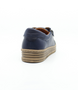 Navy women’s leather casual sneaker with lace‑up front, side zip and cushioned insole.