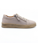Stone women’s leather casual sneaker with lace‑up front, side zip and cushioned insole.