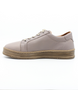 Stone women’s leather casual sneaker with lace‑up front, side zip and cushioned insole.