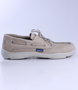 Beige men’s grained leather boat shoe with moccasin stitching and cushioned Poron footbed.