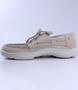 Beige men’s grained leather boat shoe with moccasin stitching and cushioned Poron footbed.