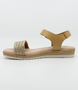 Camel girls’ woven leather flat sandal with hook‑and‑loop ankle strap and cushioned footbed.