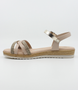 Nude girls’ woven leather flat sandal with ankle strap and cushioned footbed.