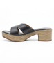 Black women’s criss‑cross leather heeled slide sandal with cushioned footbed.