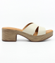 Ice women’s criss‑cross leather heeled slide sandal with cushioned footbed.