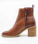 Marrone women’s leather ankle boot with side zip and stacked block heel.