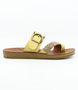 Yellow women’s buckle‑detail flat slide sandal with textured toe loop and cushioned footbed.