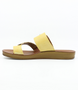 Yellow women’s buckle‑detail flat slide sandal with textured toe loop and cushioned footbed.