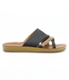 Black women’s criss‑cross textured flat slide sandal with wrapped toe loop and cushioned footbed.